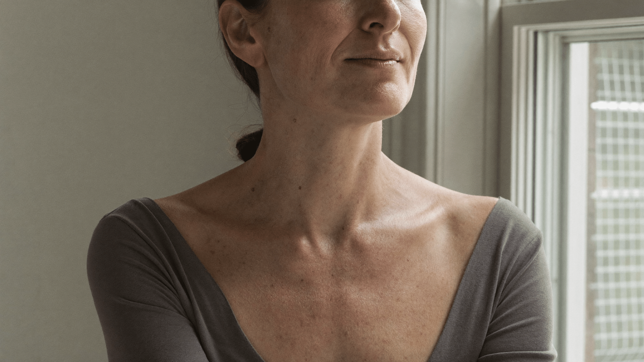 Woman reflecting on an unsatisfactory rhinoplasty result — what to do when a nose job has gone wrong, Centre for Surgery London