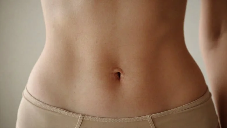 Smooth flat midriff with a neat, naturally recessed innie belly button — umbilicoplasty (belly button surgery) at Centre for Surgery, Baker Street, London