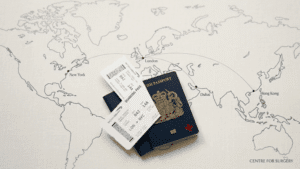 Passport, boarding pass and world map illustrating the decision to have a mummy makeover abroad versus in the UK