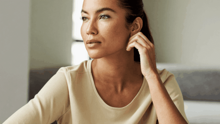 Woman considering non-surgical versus surgical rhinoplasty — comparing nose filler and nose surgery, Centre for Surgery London