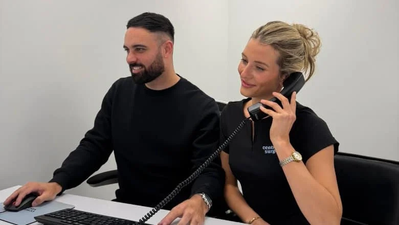 Two Centre for Surgery patient coordinators taking enquiry calls at the Baker Street clinic in London