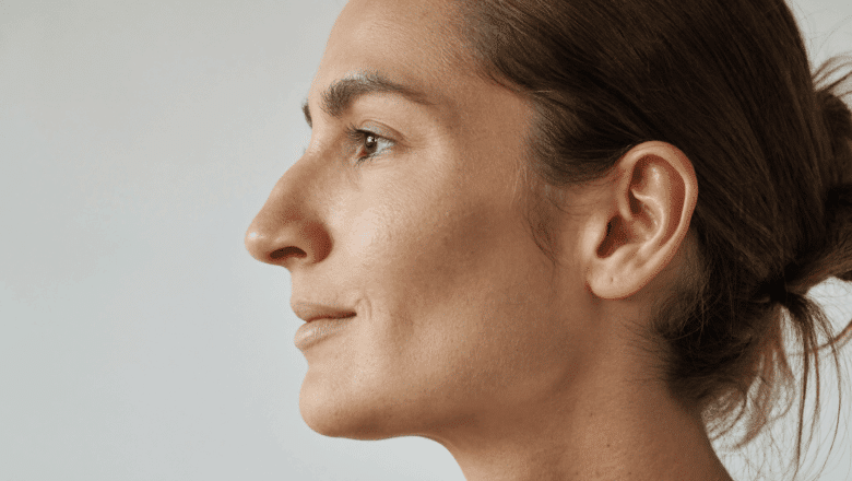 Side profile showing a short slightly upturned nose — snub nose shape, Centre for Surgery London